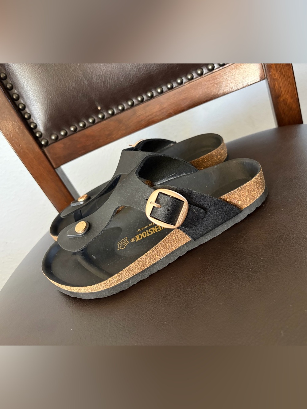 Birkenstock Black Cork Footbed T-Strap Sandals with Gold Buckle